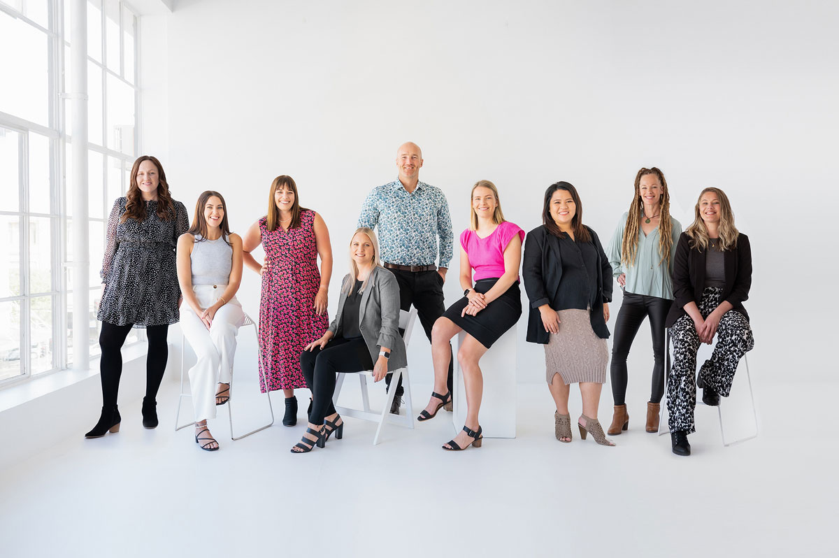 The SMYD team in a minimalist white room